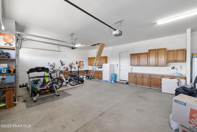 garage featuring a garage door opener