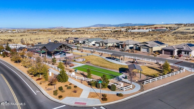 drone / aerial view with a mountain view and a residential view