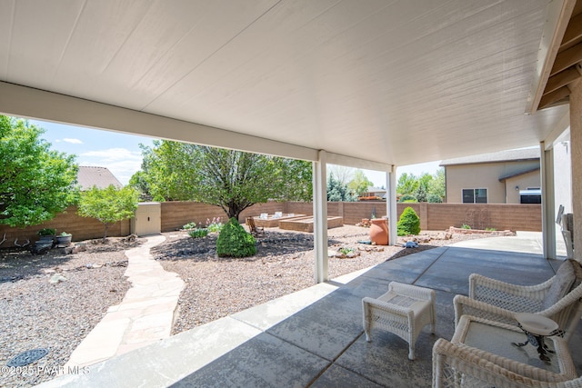 view of patio featuring a fenced backyard