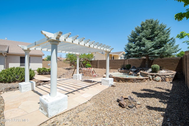 view of yard featuring a patio, a fenced backyard, and a pergola