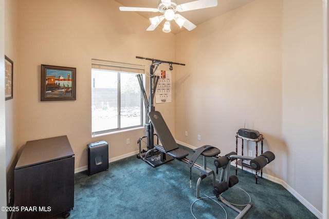 exercise room with baseboards, carpet, and ceiling fan