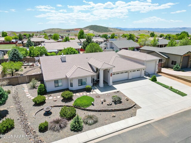 bird's eye view with a residential view and a mountain view