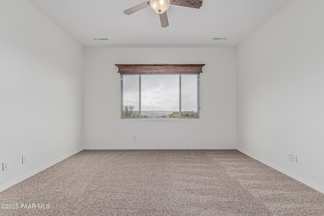 893 Canyon Breeze Ct, Prescott, AZ 86303 - empty room featuring ceiling fan, carpet, and baseboards