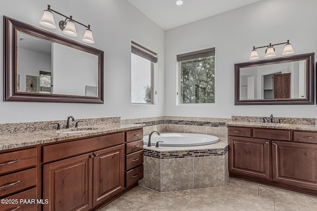 893 Canyon Breeze Ct, Prescott, AZ 86303 - full bathroom featuring a garden tub, two vanities, and tile patterned floors