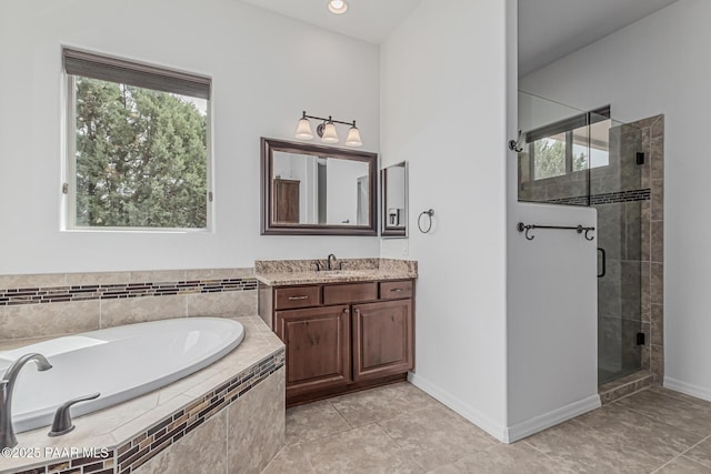 893 Canyon Breeze Ct, Prescott, AZ 86303 - full bathroom featuring healthy amount of natural light, a stall shower, a bath, and vanity