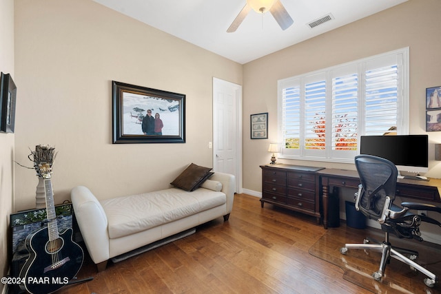 office space with wood-type flooring and ceiling fan