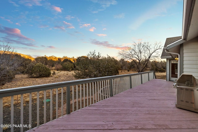 view of deck at dusk