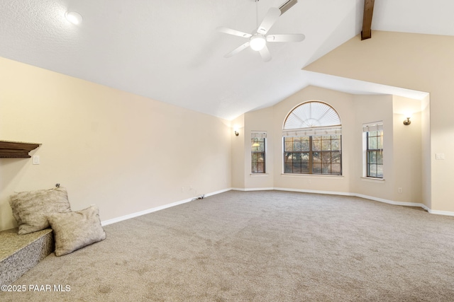 unfurnished living room featuring ceiling fan, lofted ceiling with beams, and carpet