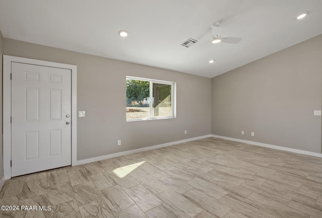 empty room featuring ceiling fan