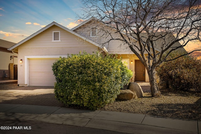 view of front of home with a garage