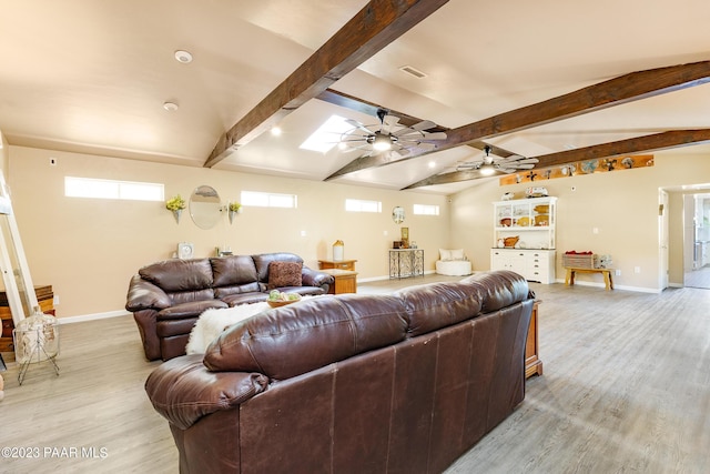 living room with vaulted ceiling with beams, ceiling fan, and light hardwood / wood-style floors