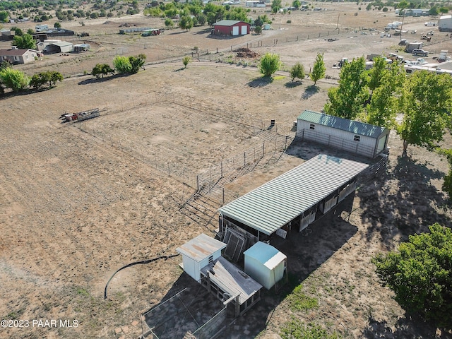 birds eye view of property featuring a rural view