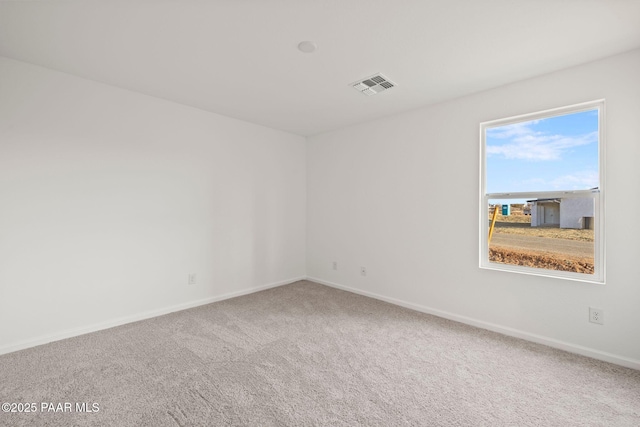 empty room featuring carpet floors