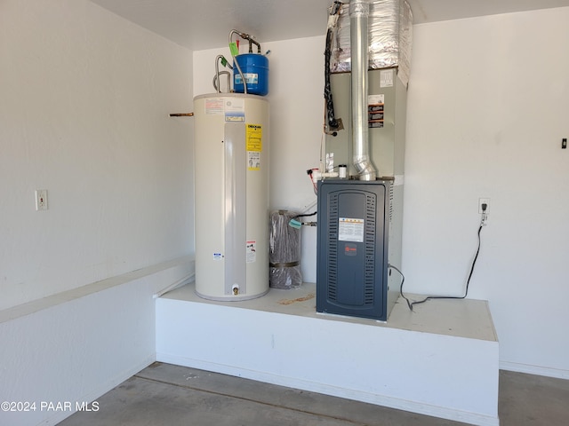 utility room featuring electric water heater