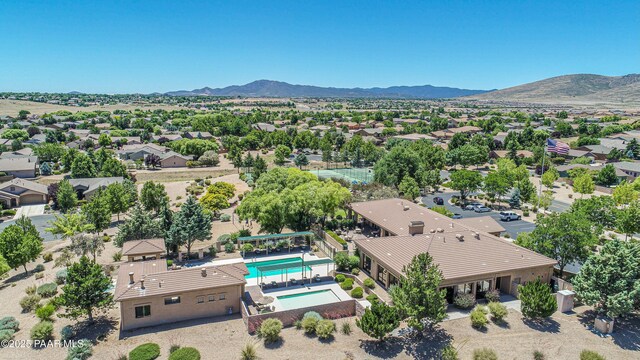 3824 N Wakefield Dr, Prescott Valley, AZ 86314 - aerial view of residential area featuring a pool and a mountain backdrop