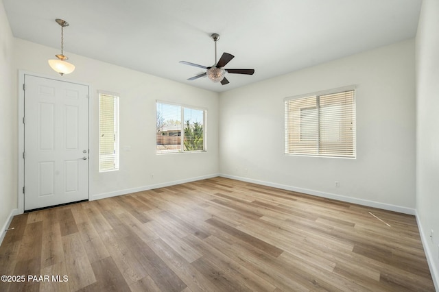 3824 N Wakefield Dr, Prescott Valley, AZ 86314 - entryway with a ceiling fan, light wood-type flooring, and baseboards