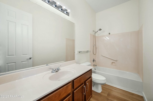 3824 N Wakefield Dr, Prescott Valley, AZ 86314 - full bathroom featuring toilet, vanity, wood finished floors, and bathtub / shower combination