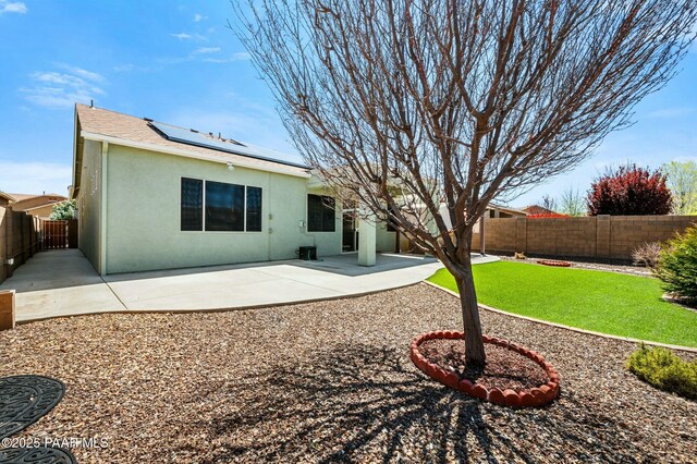 3824 N Wakefield Dr, Prescott Valley, AZ 86314 - rear view of house featuring solar panels, stucco siding, and a patio