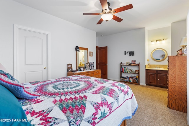 9520 Poland Rd, Mayer, AZ 86333 - bedroom featuring a sink, light colored carpet, ceiling fan, and connected bathroom