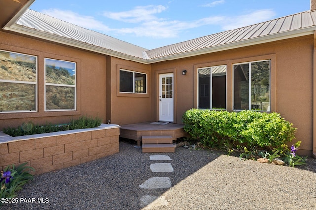 9520 Poland Rd, Mayer, AZ 86333 - property entrance featuring metal roof, stucco siding, and a standing seam roof
