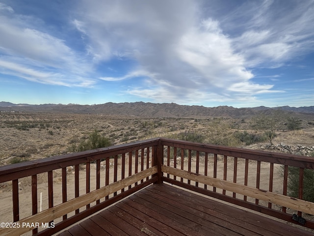 wooden terrace with a mountain view