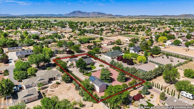 977 Kristin St, Chino Valley, AZ 86323 - aerial view of residential area featuring property parcel outlined and mountains