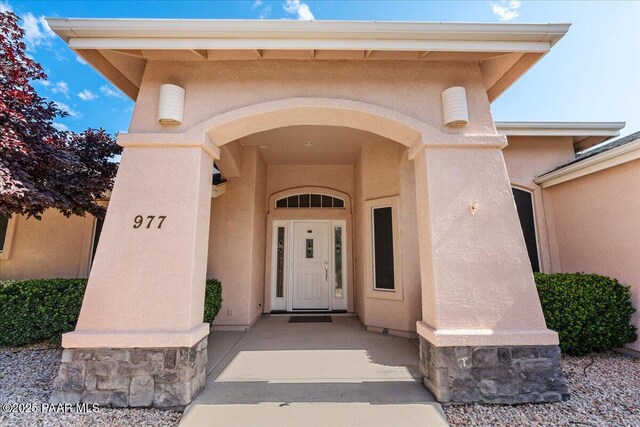 977 Kristin St, Chino Valley, AZ 86323 - doorway to property featuring stucco siding