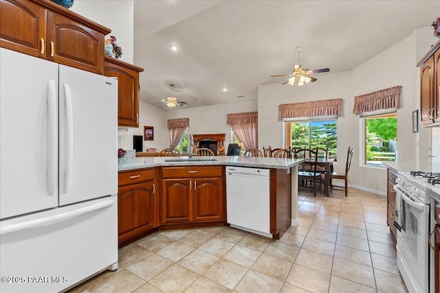 977 Kristin St, Chino Valley, AZ 86323 - kitchen with white appliances, a peninsula, ceiling fan, recessed lighting, and open floor plan