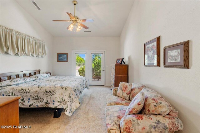 977 Kristin St, Chino Valley, AZ 86323 - carpeted bedroom featuring access to outside, lofted ceiling, and a ceiling fan