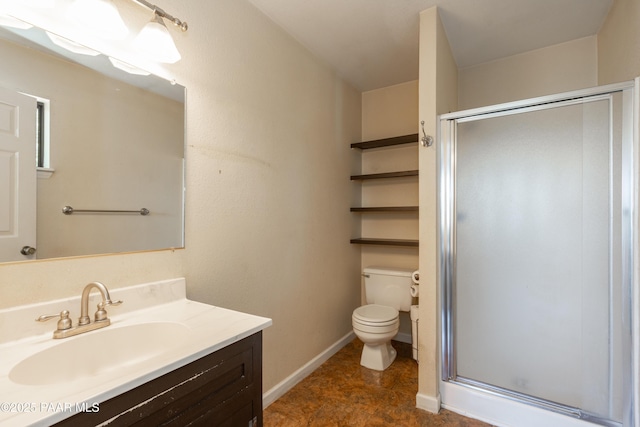 full bath with baseboards, toilet, a stall shower, and vanity