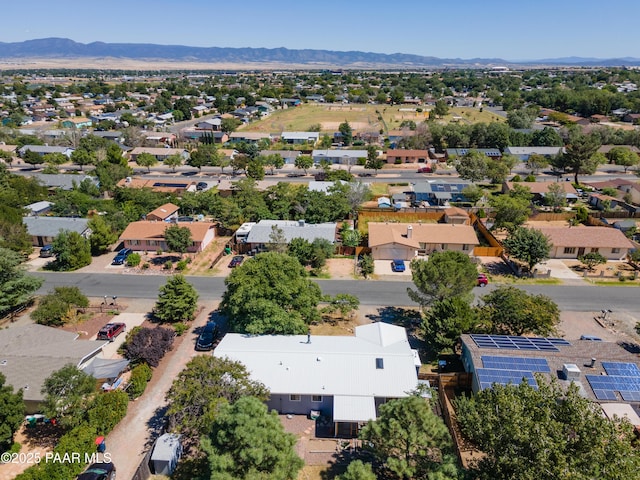 birds eye view of property featuring a mountain view and a residential view