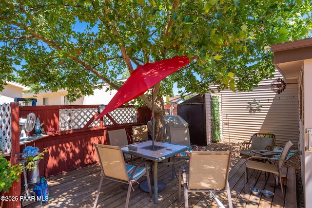 11009 E Lariat Ln, Dewey-Humboldt, AZ 86327 - wooden deck featuring outdoor dining area and area for grilling