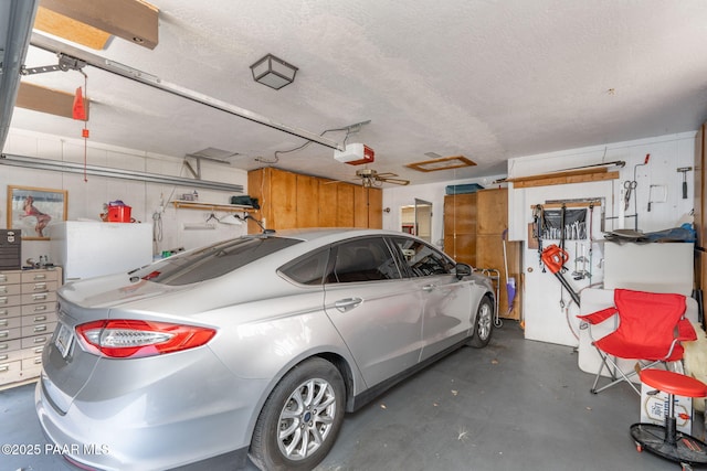 11009 E Lariat Ln, Dewey-Humboldt, AZ 86327 - garage featuring a garage door opener