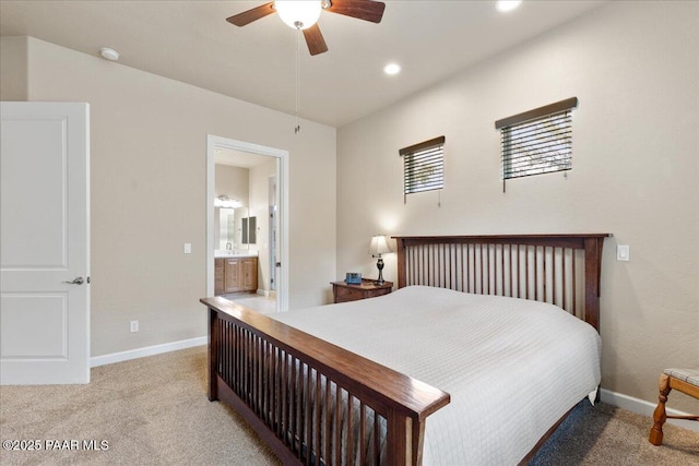bedroom with ensuite bathroom, baseboards, ceiling fan, recessed lighting, and light carpet