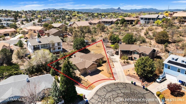 aerial view with a residential view and a mountain view