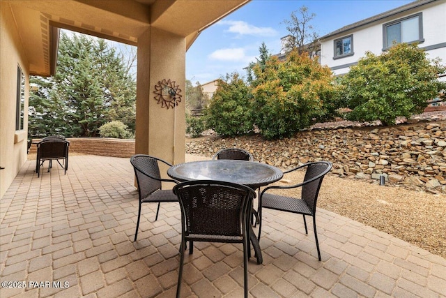 view of patio with outdoor dining area