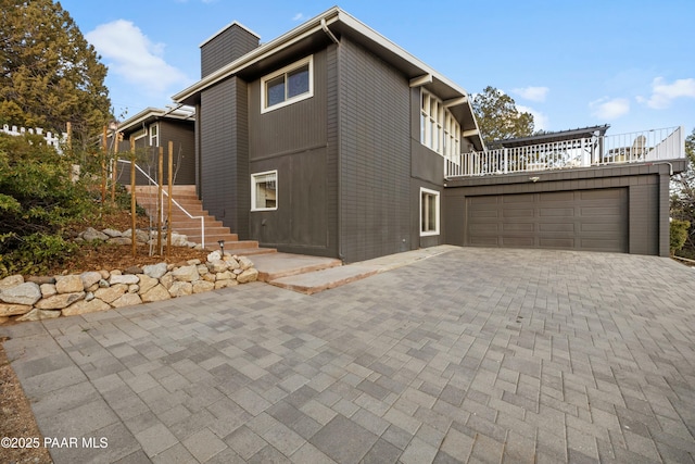 view of front of property featuring a garage