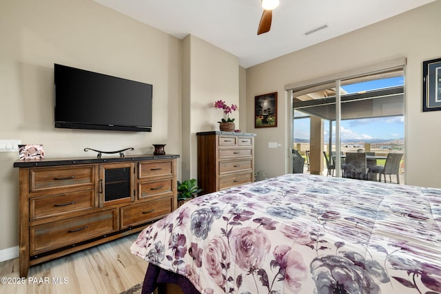 5242 High Cliff Way, Prescott, AZ 86301 - bedroom with access to exterior, light wood-type flooring, and ceiling fan
