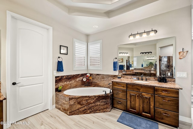 5242 High Cliff Way, Prescott, AZ 86301 - bathroom featuring vanity, a garden tub, and wood finished floors