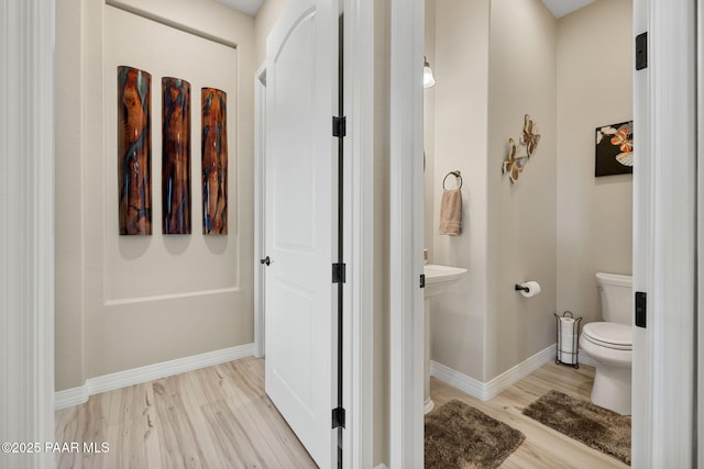 5242 High Cliff Way, Prescott, AZ 86301 - bathroom featuring wood finished floors, toilet, and baseboards