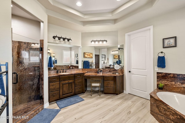 5242 High Cliff Way, Prescott, AZ 86301 - full bathroom with a shower stall, vanity, a bath, wood finished floors, and a raised ceiling