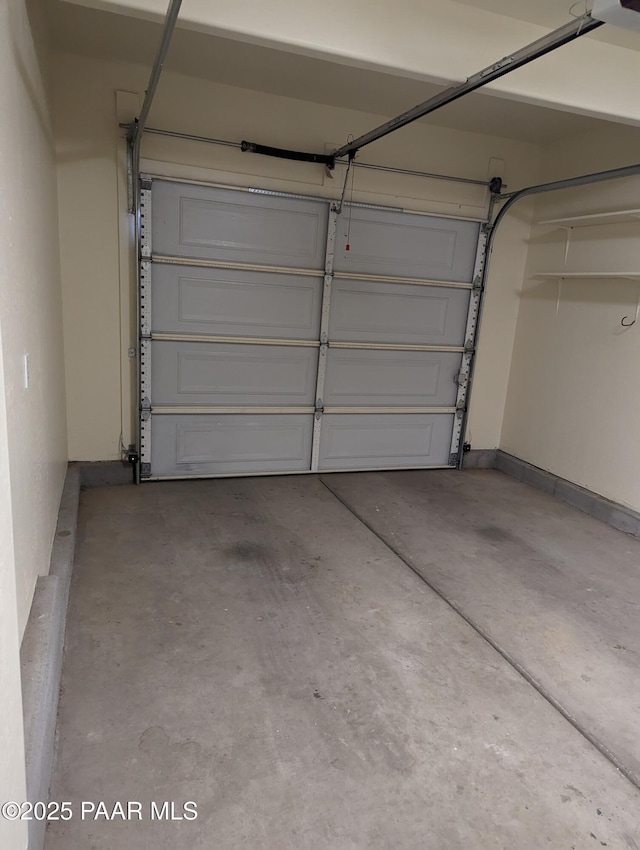 garage featuring baseboards