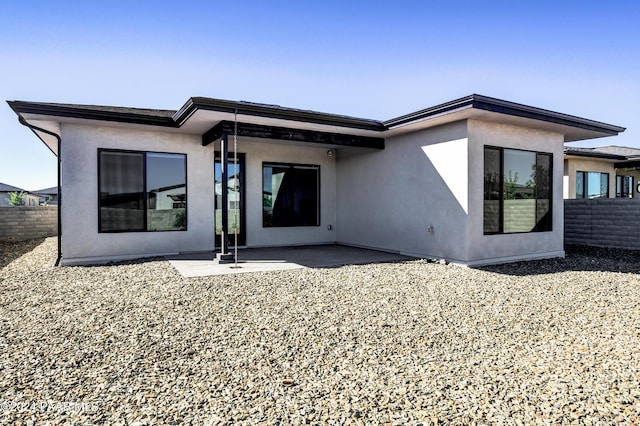 rear view of house featuring a patio area