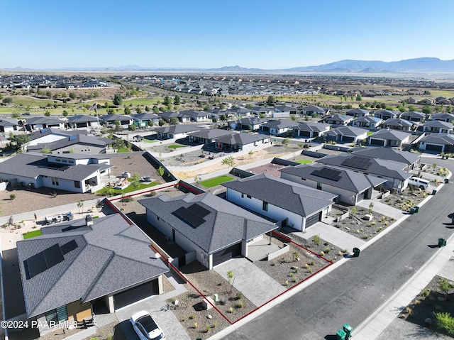 drone / aerial view featuring a mountain view