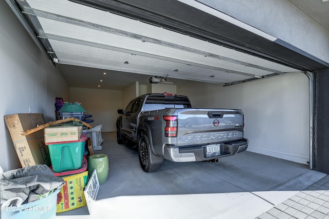 garage featuring a garage door opener