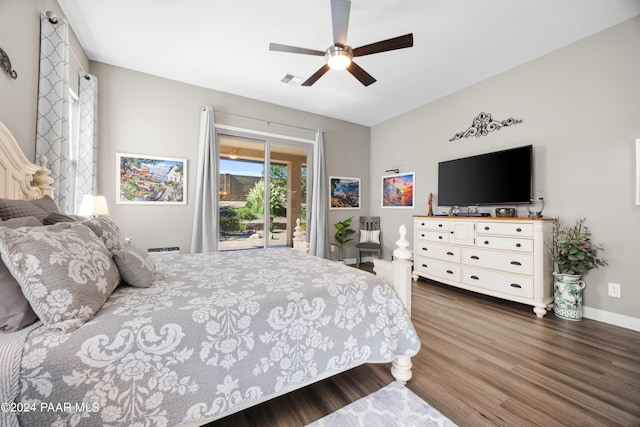 bedroom with access to exterior, ceiling fan, and dark wood-type flooring