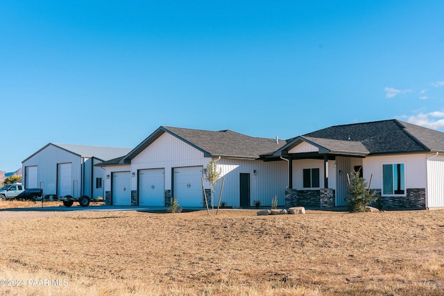 view of front of property with a garage