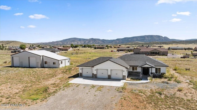 drone / aerial view featuring a mountain view