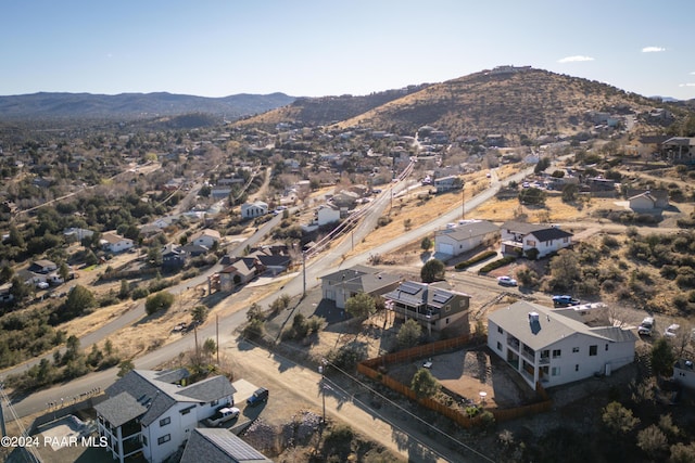 birds eye view of property featuring a mountain view