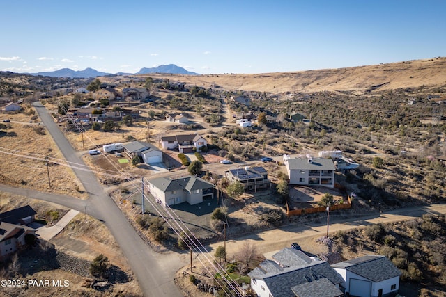 birds eye view of property featuring a mountain view